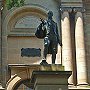 Statue of Matthew Flinders in front of the Mitchell Library, Macquarie St, Sydney, with his cat Trim in the background