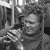 Ship's kitten Felix aboard Mayflower II with cabin boy Graham Nunn, prior to sailing from Plymouth