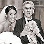 Rector Hank Franklin holds Samuel at the wedding of Hank's daughter, 2005 - Emmanuel Episcopal Church, Southern Pines, North Carolina