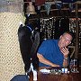 Boots doing his party piece at the bar, ringing a ship's bell, Vanuatu waterfront